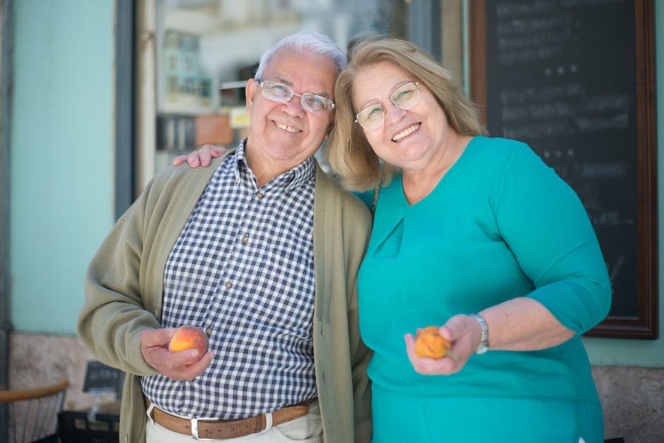 male and female caregiver with older man